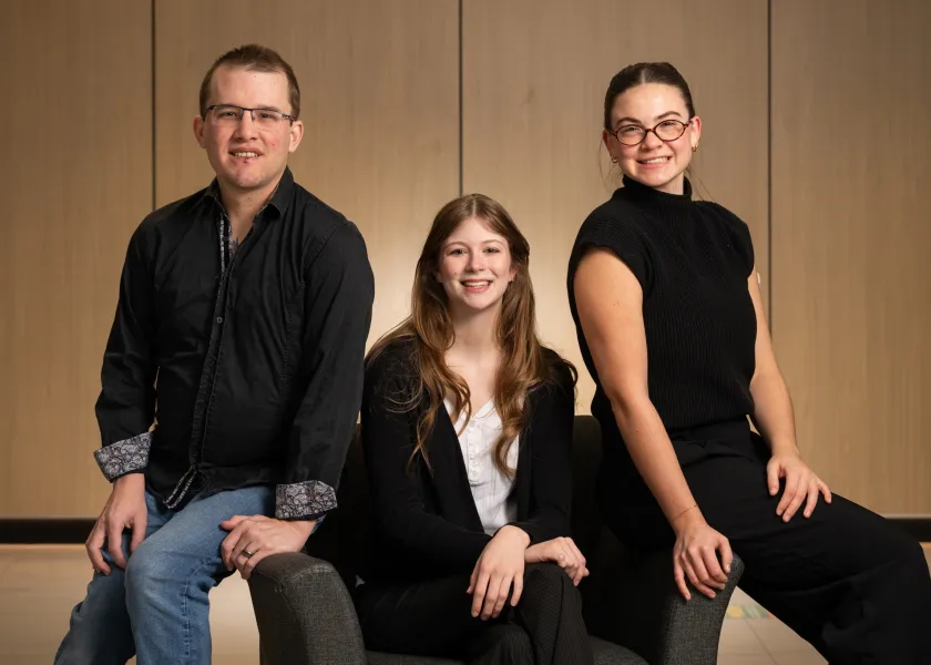 NDSU Interior design students Joshua Allan, Victoria Mitchell and Louisa Linder pose for a photo. 