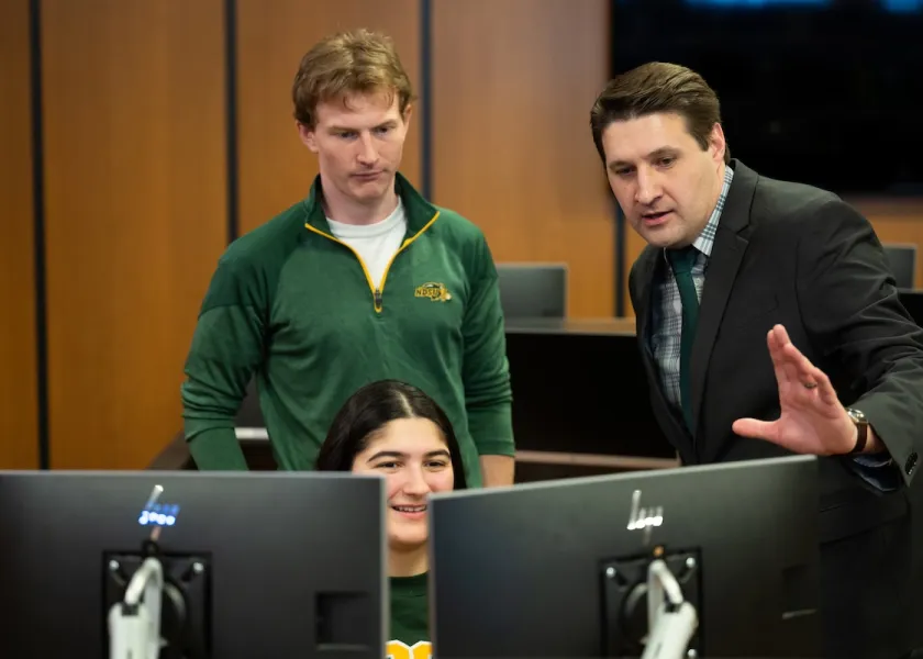 Finance Professor helping students