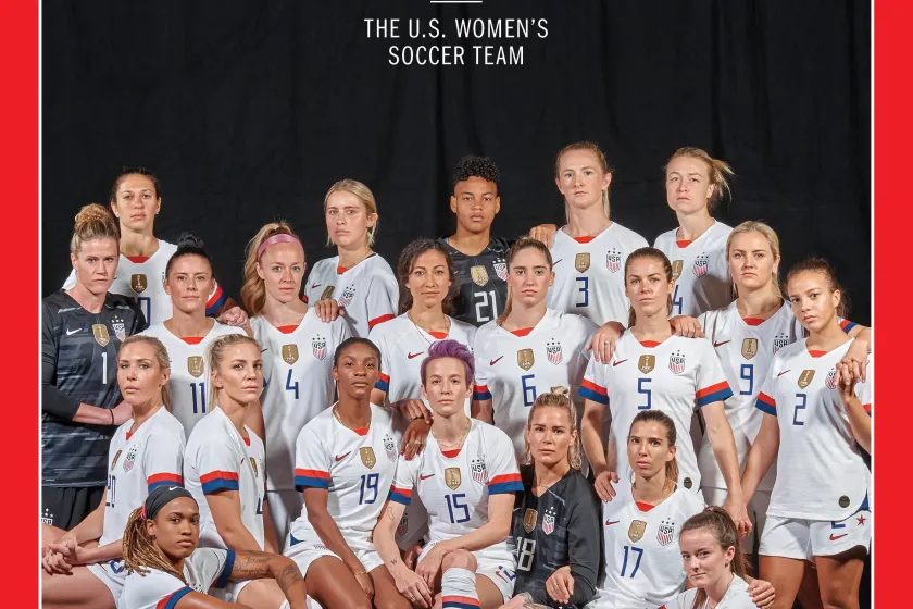 Time written on top with women's soccer team looking at the camera