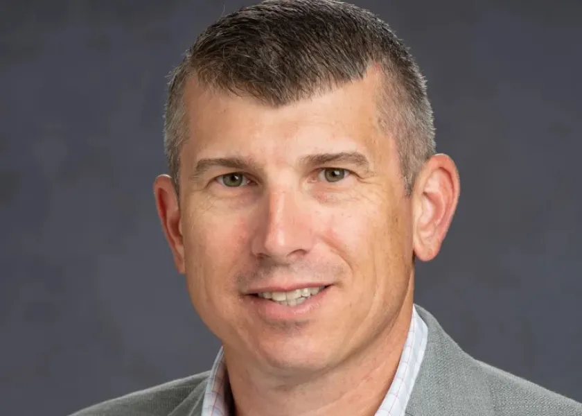 NDSU assistant professor of health, nutrition and exercise science, Nathan Dicks, poses for a headshot.