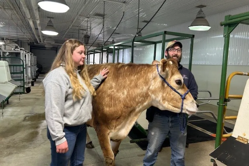 Ashley and Justin with cow at ANPS