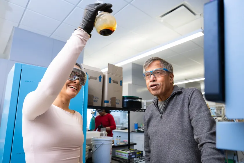NDSU professor Mukund Sibi works with a Chemistry student