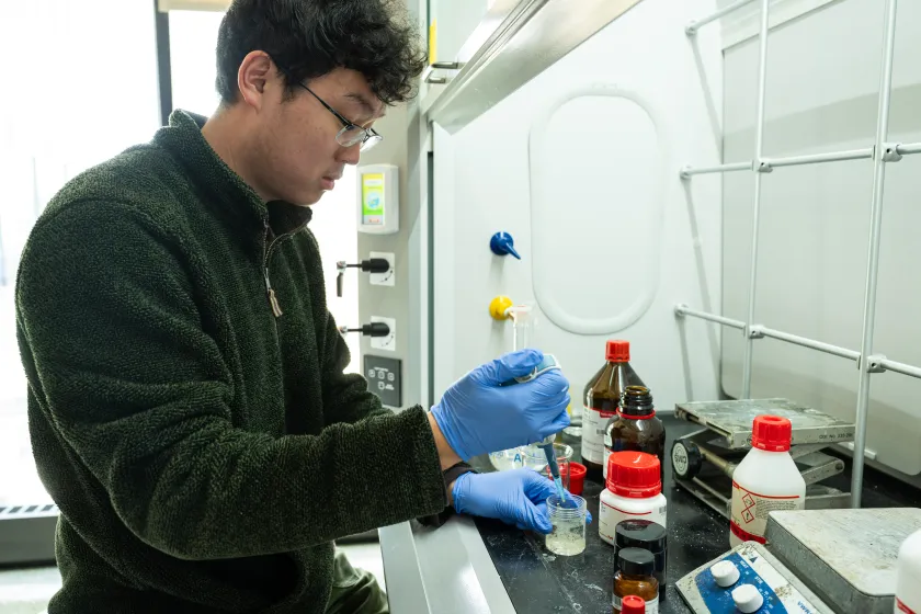 NDSU student Zubin Park performing an experiment in the chemistry lab