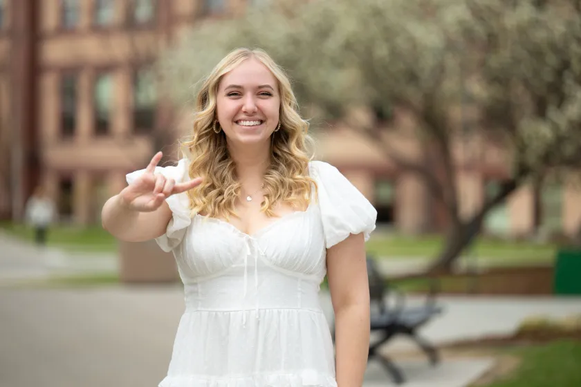 Paige Sanders, who is graduating with a degree in environmental engineering, poses for a photo.
