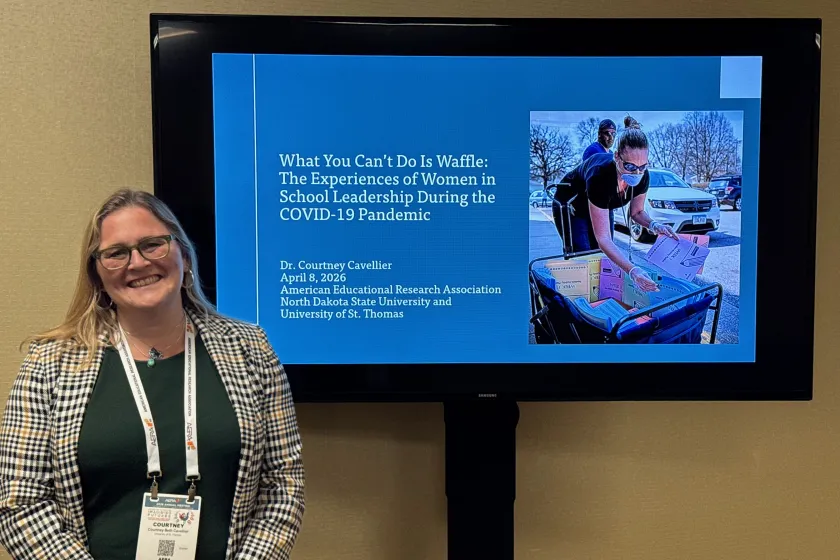 Courtney Cavellier presenting at the AERA conference.