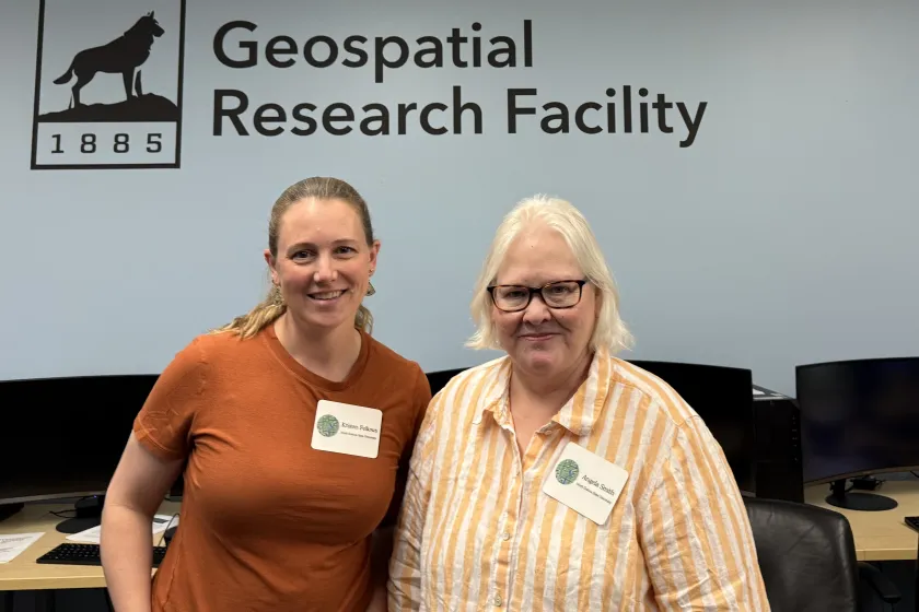 Kristen Fellows (left) and Angela Smith (right) pose for a photo at the Geospatial Research Facility.