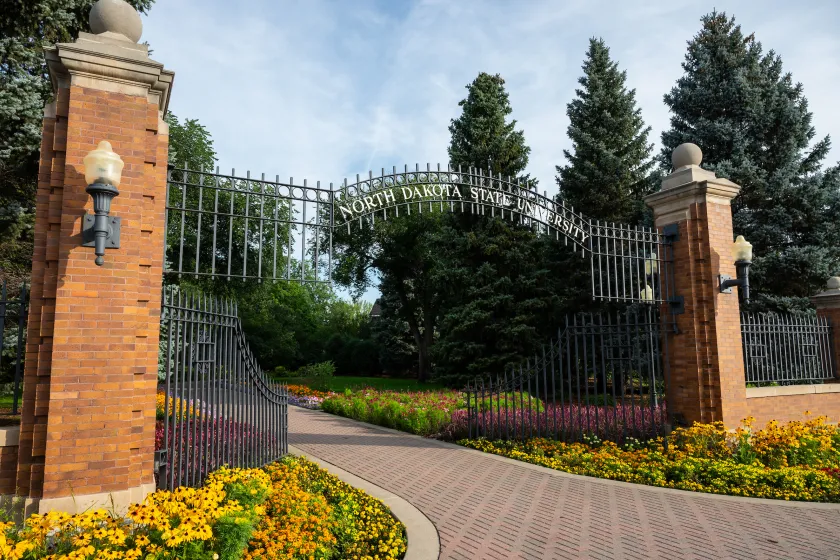 Brick columns and an iron gate