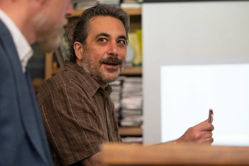 University Distinguished Professor of psychology, Michael D. Robinson, talks to students.