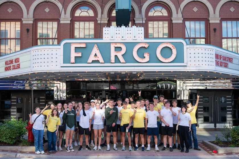 The inaugural NDSU Honors College cohort in front of the Fargo Theatre downtown.