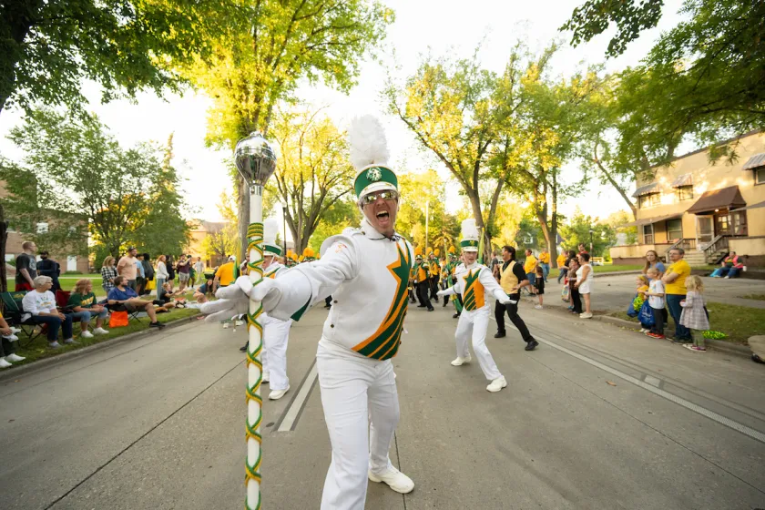 NDSU Marching Band Leader strikes a pose during the Homecoming Parade.