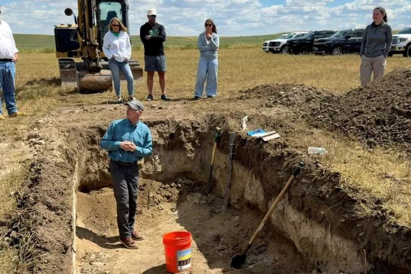 Photo of Tom DeSutter and students at soil dig