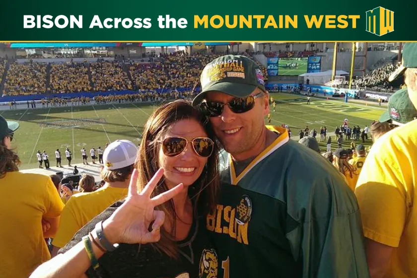 Rob Grosz and his wife Amy at a football game