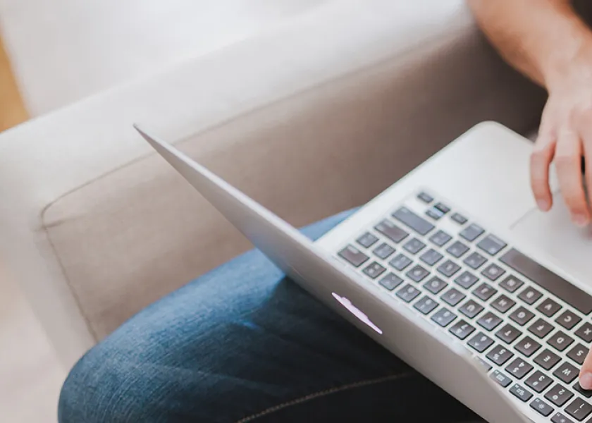Man using computer to search for courses