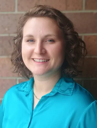 headshot of Yssi Entzie