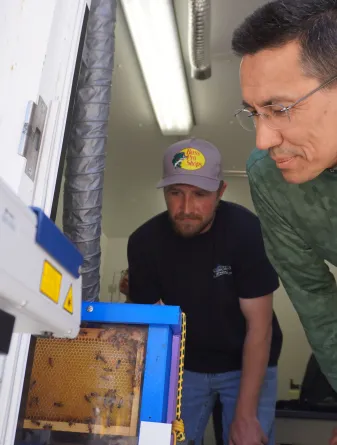 North Dakota State University assistant professor of agricultural and biosystems engineering, Sulaymon Eshkabilov, stands in his lab.
