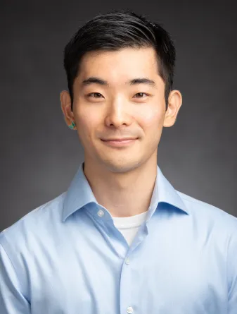 Towa staring confidently at the camera