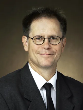 Headshot of Joel Caton