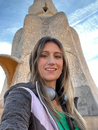 Woman in front of tower