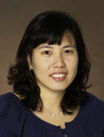 Jaeha Lee smiling confidently at camera.