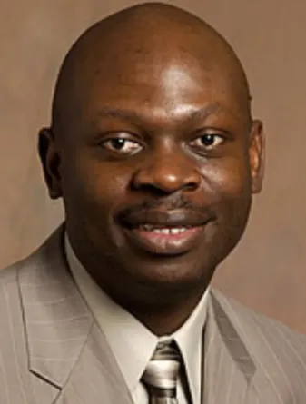 Peter smiling confidently