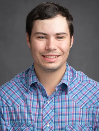 Headshot of Kell Hellmuth