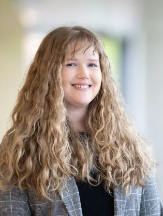 Woman posing for headshot photo