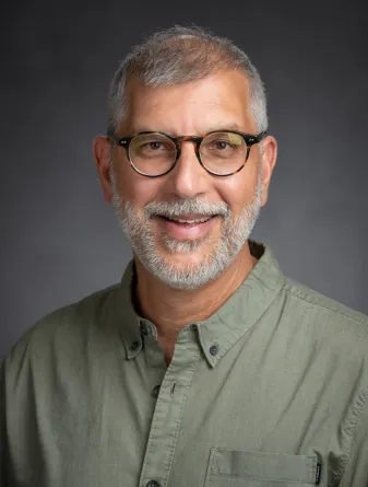 Professor Saini-Eidukat smiling confidently to the camera