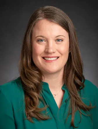 Woman in green shirt