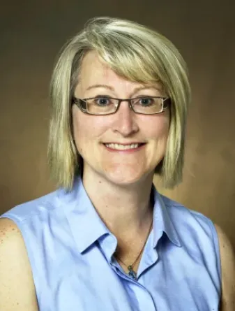 Woman in blue shirt