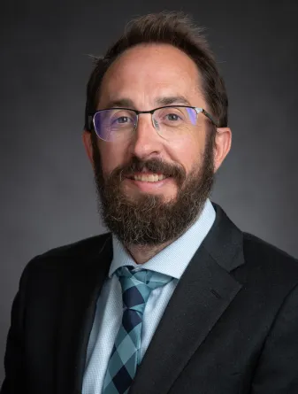 photo of man in suit and tie