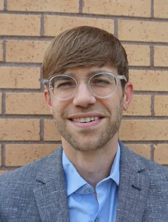 Dr. Jeremy Hamm confidently staring at the camera