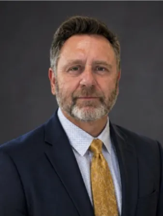 Dr. Nawrot confidently staring at the camera
