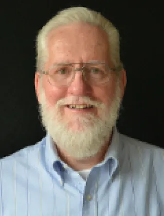 Ted Esslinger smiling confidently