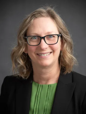 Kendra Greenlee smiling confidently.