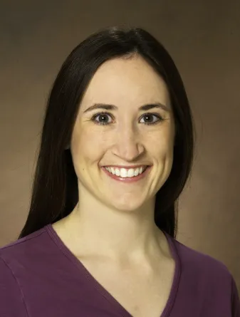 Katie Reindl smiling confidently.