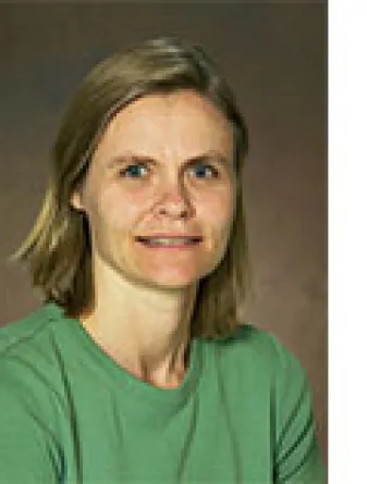 Angela Hodgson smiling confidently.