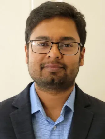 Bappaditya Chandra smiling confidently at the camera