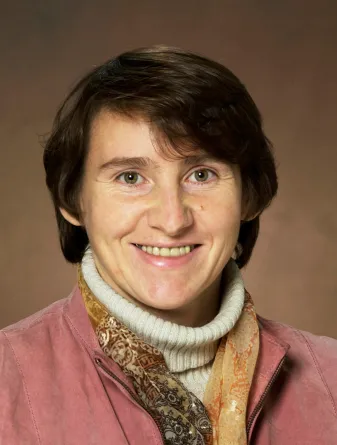 Svetlana Kilina smiling confidently at the camera