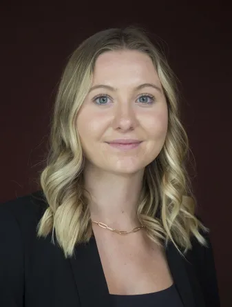 Ashlyn smiling at the camera.