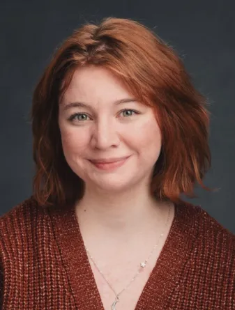 Hanna smiling at the camera