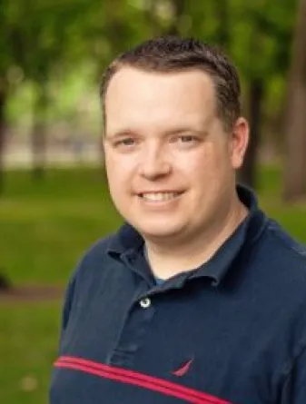 Jason smiling at the camera