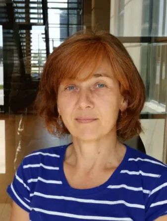 Olena Shafranska smiling confidently into the camera.