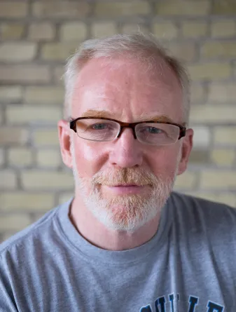 Jeff Hanson smiling at the camera.