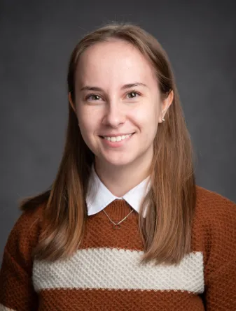 Emily confidently staring at the camera