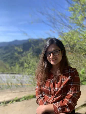 Susmita smiling at the camera