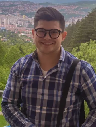 Alen Fejzic smiling confidently at camera. 