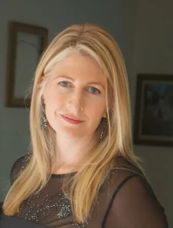 Alison Graham-Bertolini looking confidently at camera. 