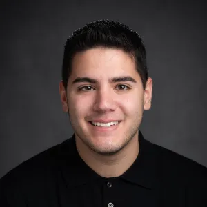 A young man smiling