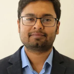 Bappaditya Chandra smiling confidently at the camera