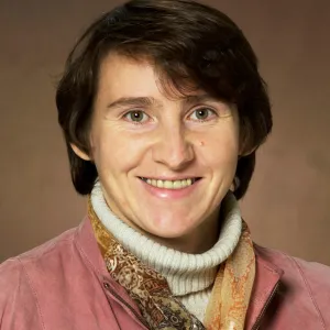 Svetlana Kilina smiling confidently at the camera